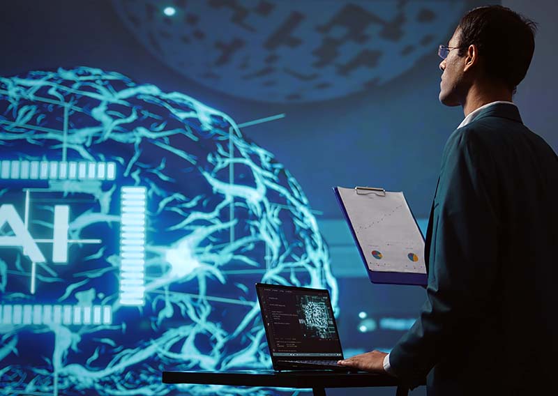 startup-employee-looking-business-charts-using-ai-software